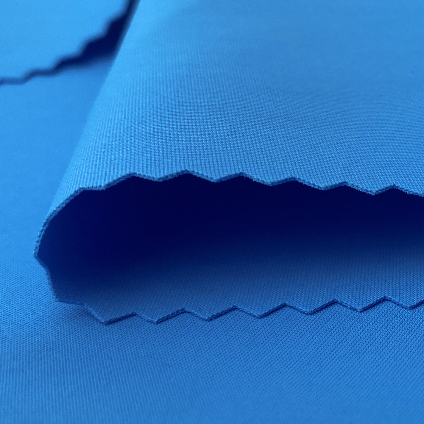 KAIN LAMINASI BIRU